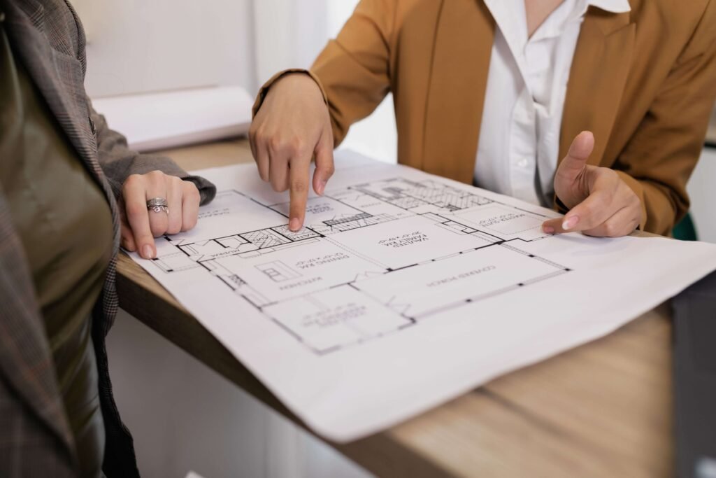 New home plans blueprint being reviewed